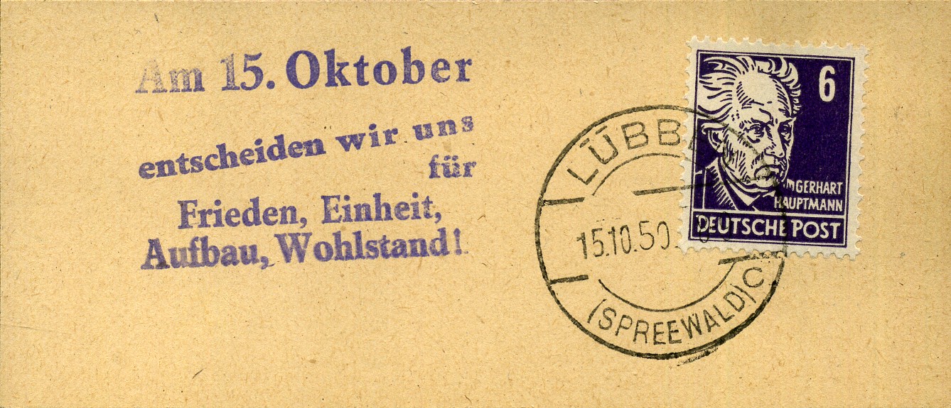 Am 15. Oktober entscheiden wir uns für Frieden, Einheit, Aufbau, Wohlstand! - Handstempel - violett - Lübben